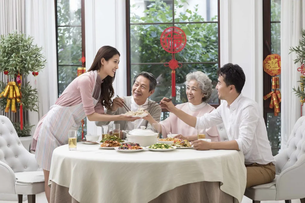 happy family having chinese new year dinner 2024 10 11 16 05 57 utc