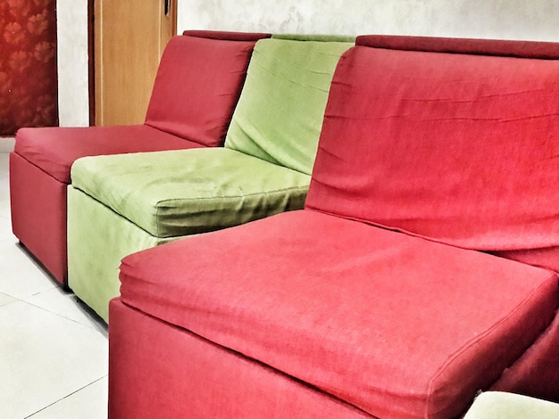 Red and green sofa in house