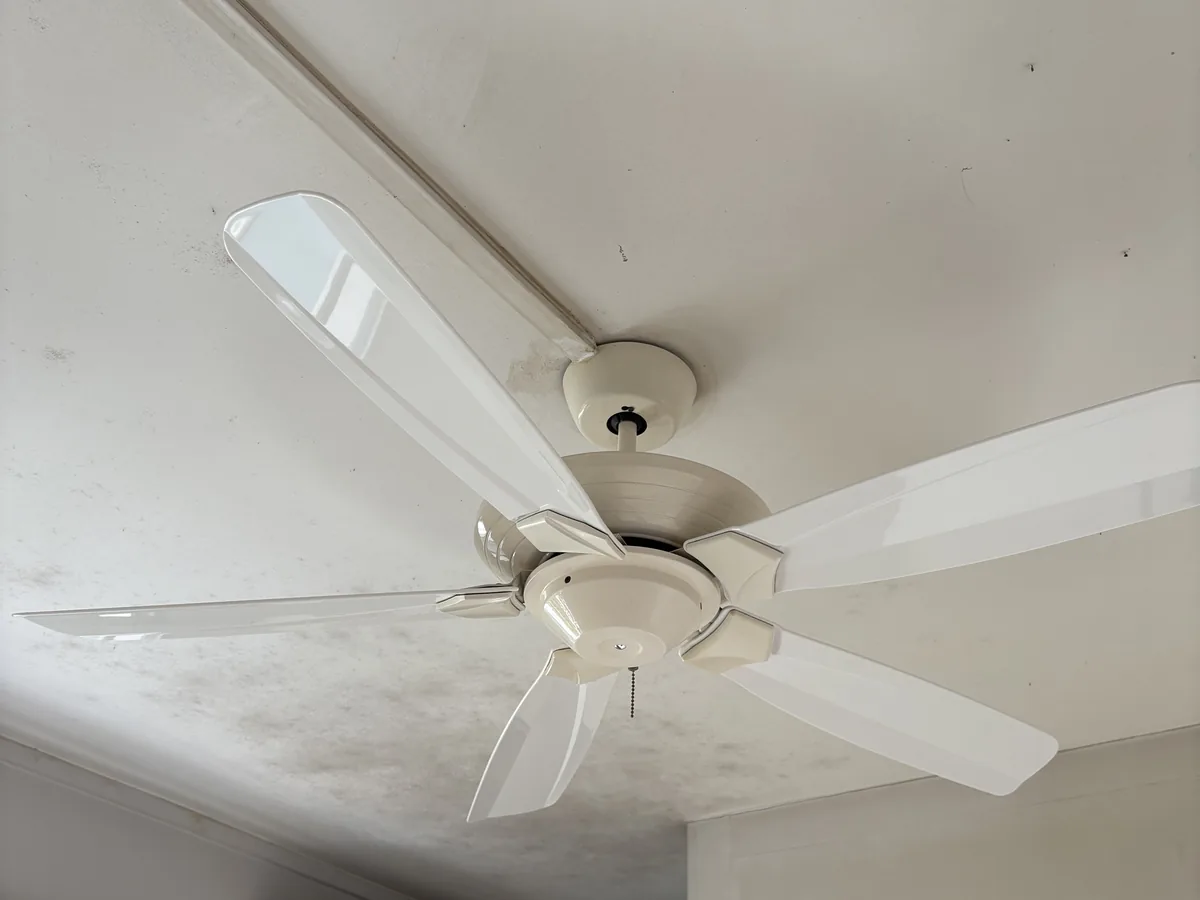 Master bedroom ceiling and air-conditioning unit after the room refresh, clean and uncluttered